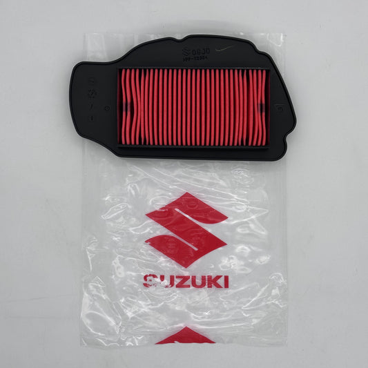 Suzuki air filter in packaging on a gray background