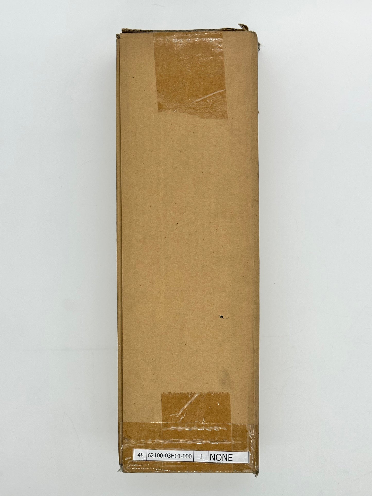 Cardboard box with a label on a white background