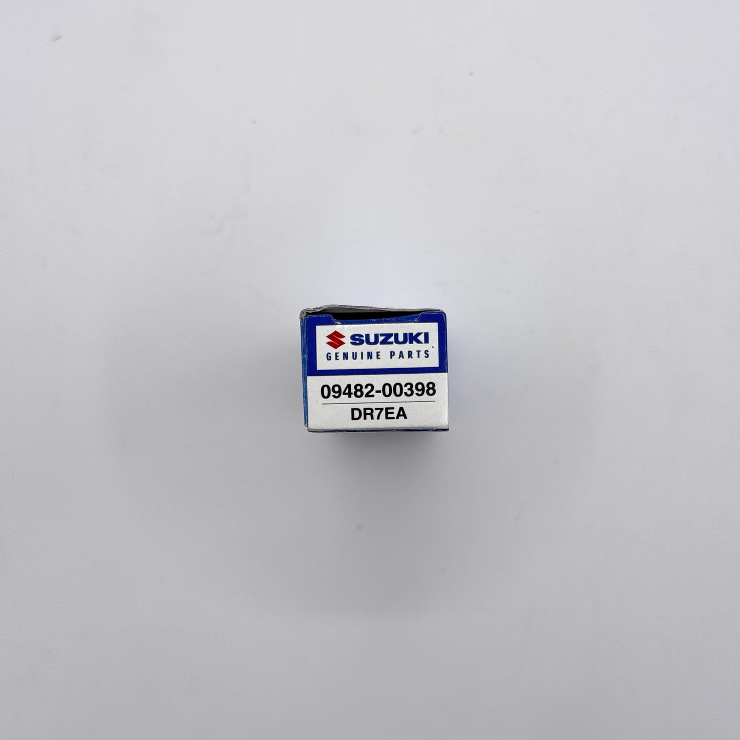 Suzuki genuine parts box with part number on a white background