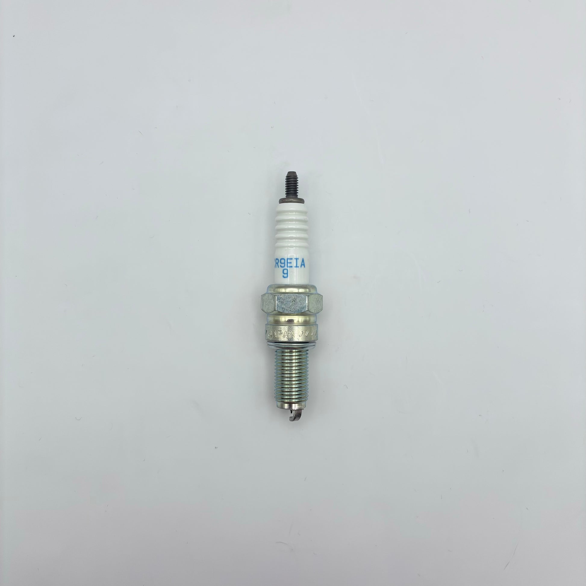 Spark plug on a white background