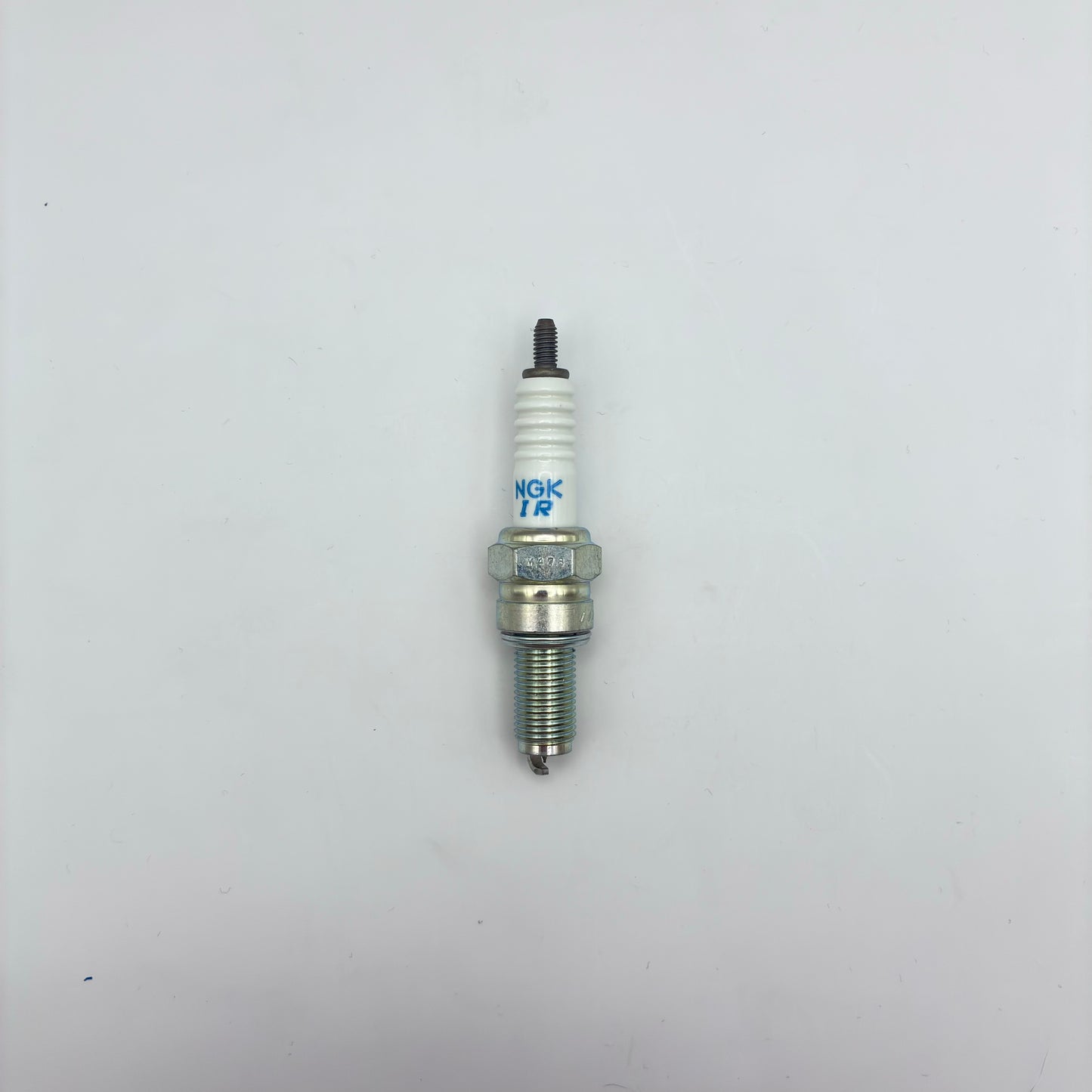 Spark plug on a white background