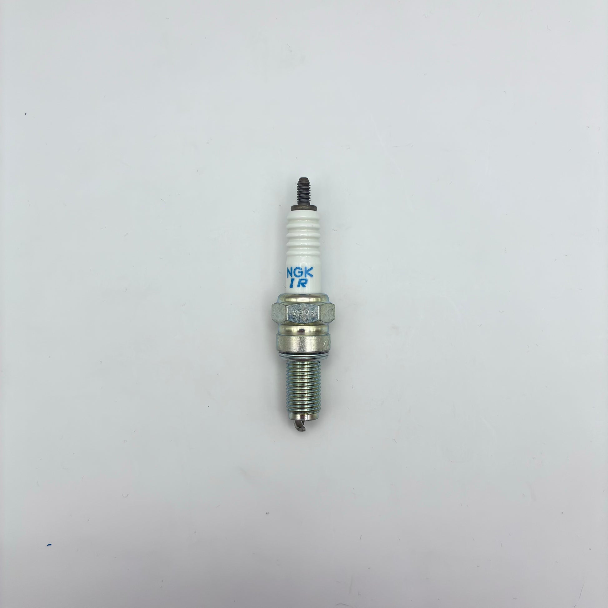 Spark plug on a white background