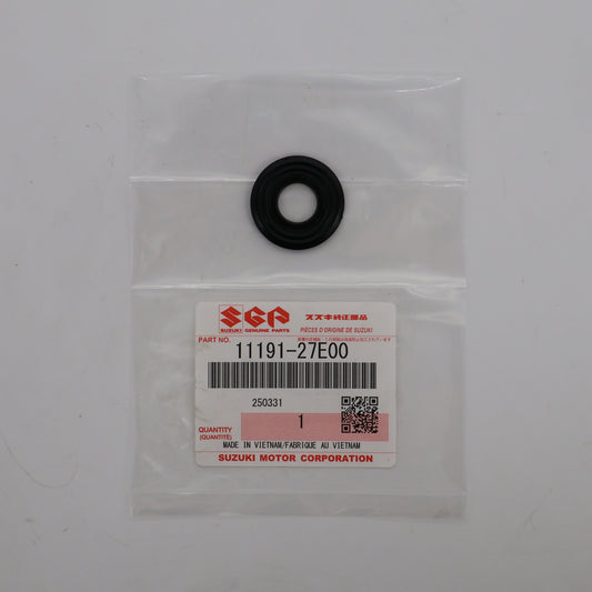 Black rubber washer in a clear plastic bag with a Suzuki label on a white background