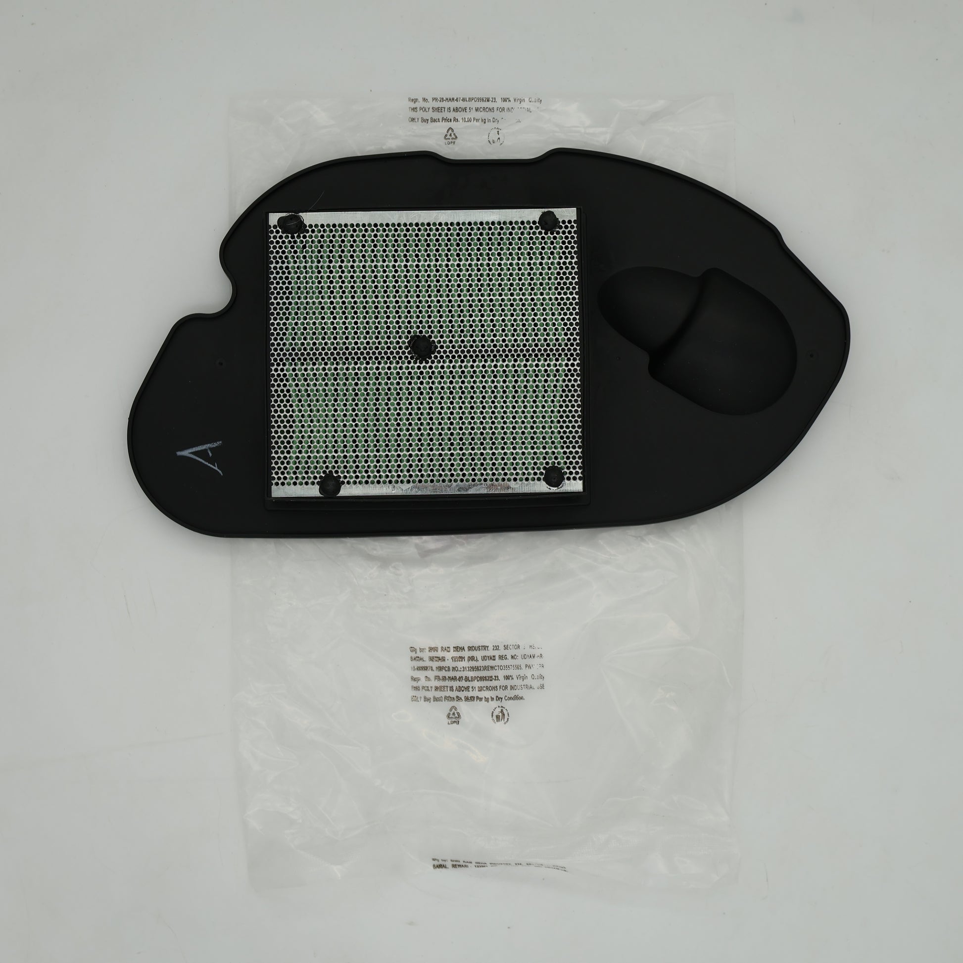 Black car mat with geometric pattern on a white background