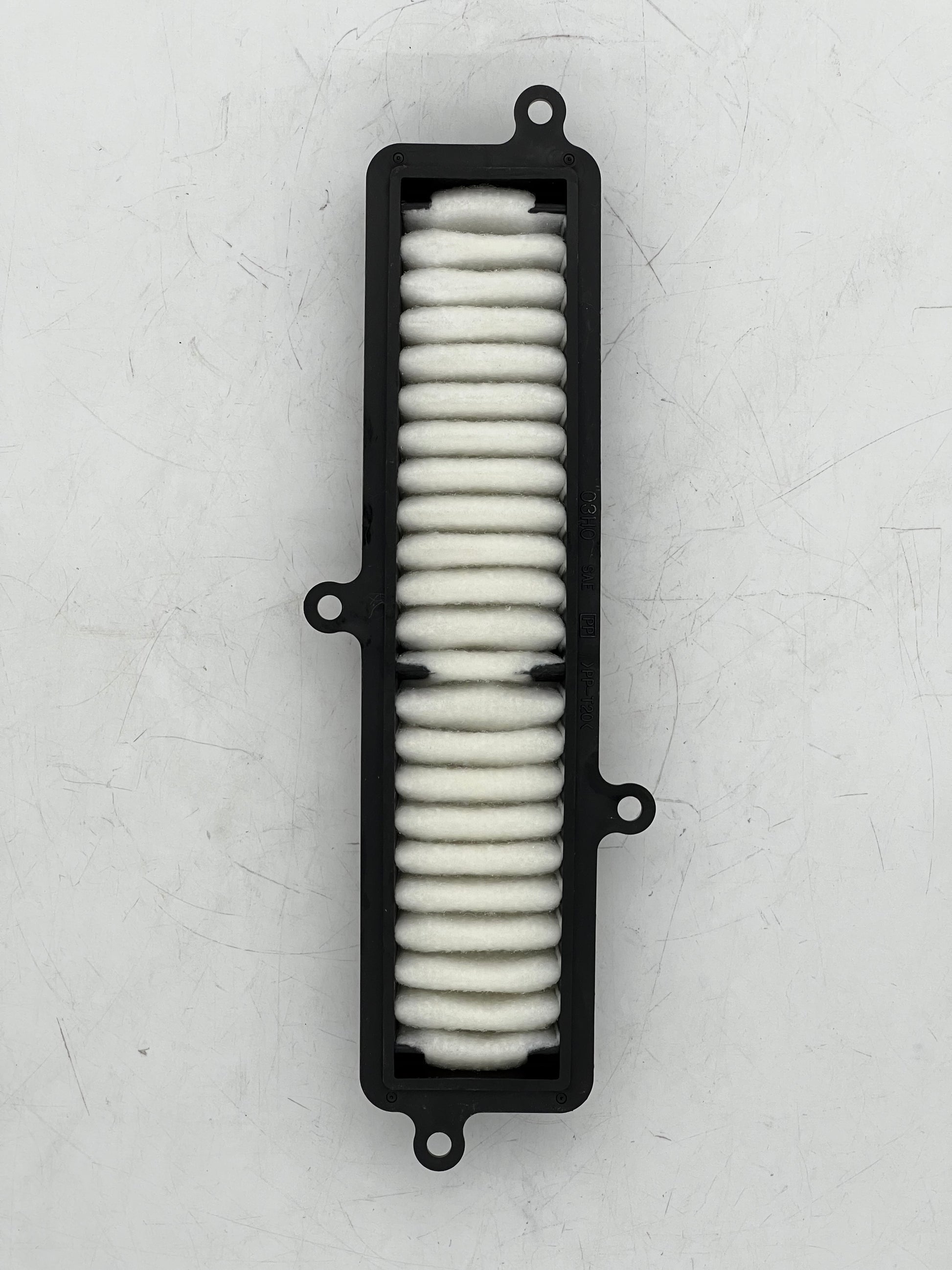 Filter with white ceramic discs on a gray background