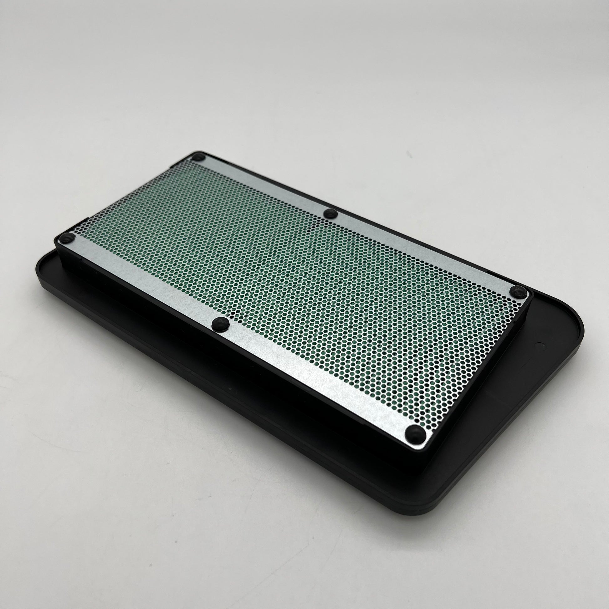 Metallic cooling fin on a gray background