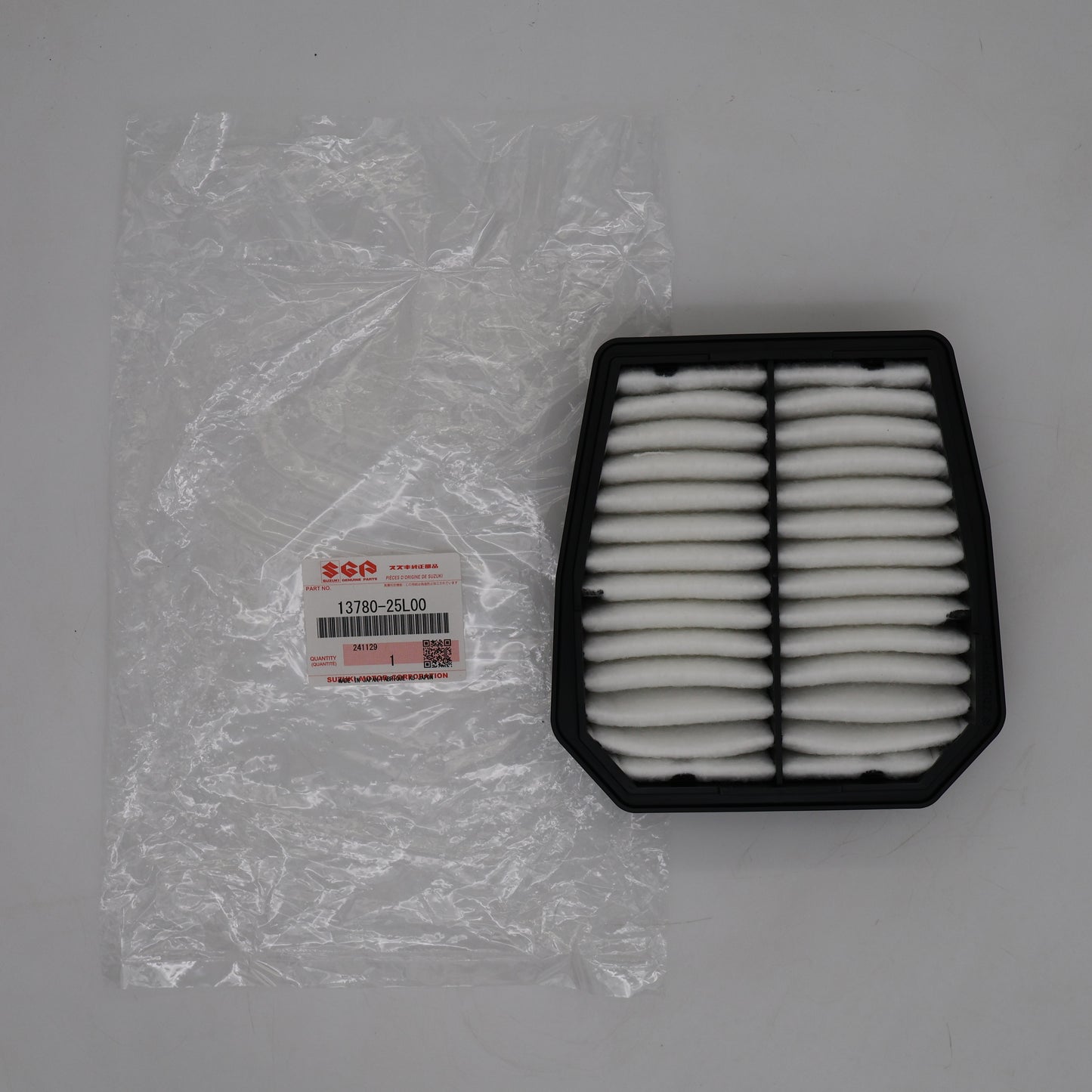 Air filter and packaging on a gray background
