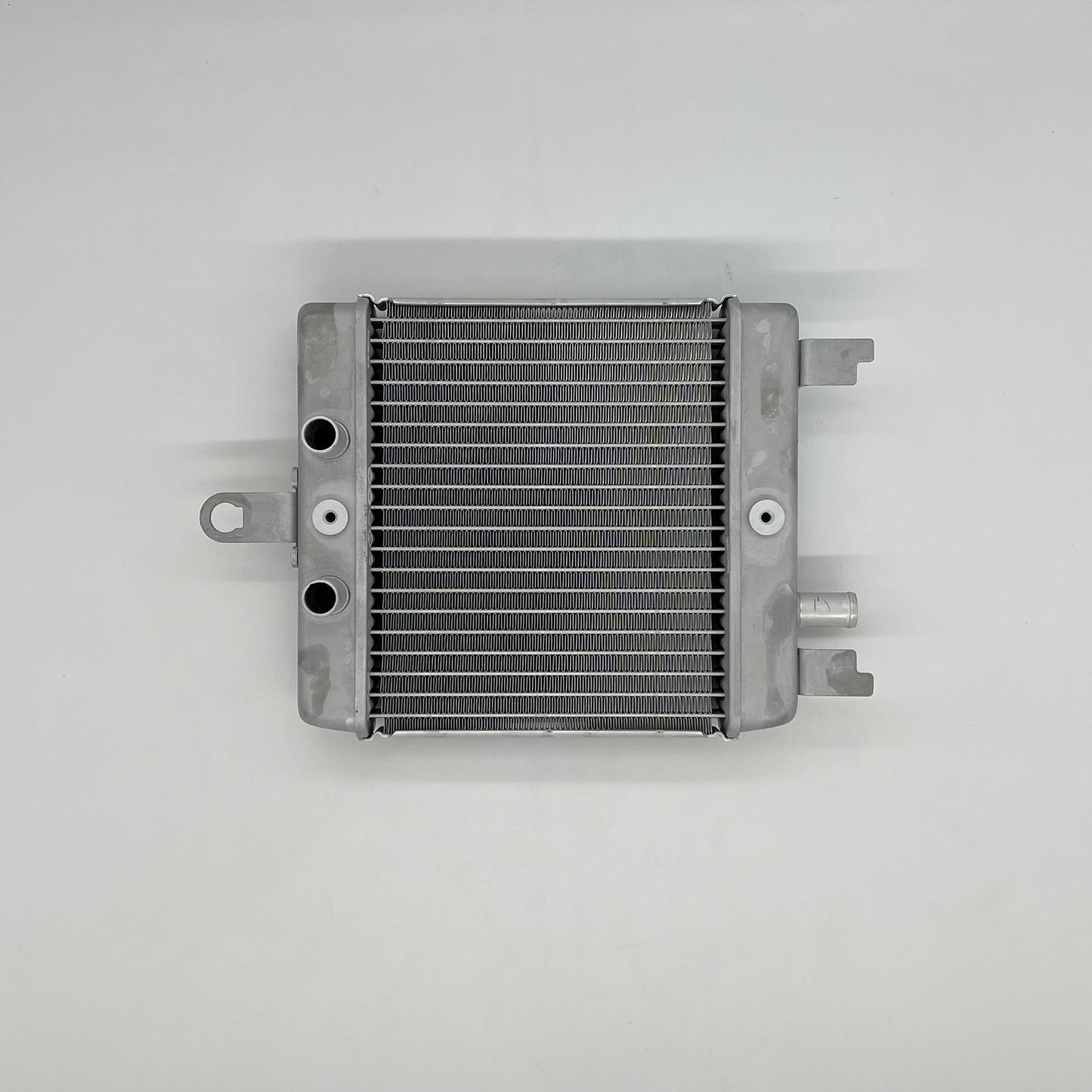 Metallic radiator on a white background