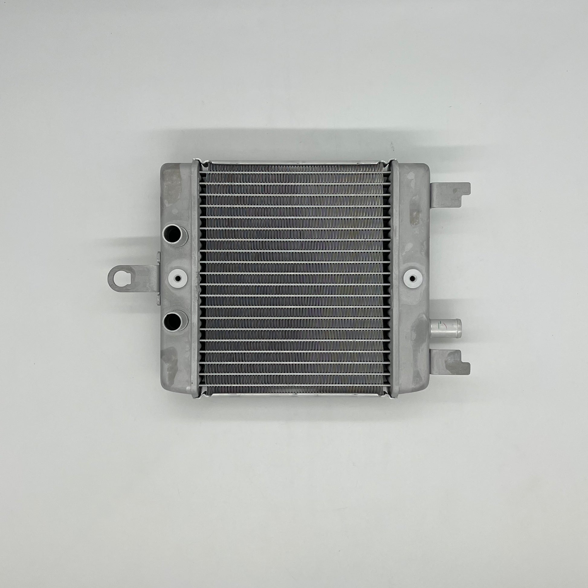 Metallic radiator on a white background