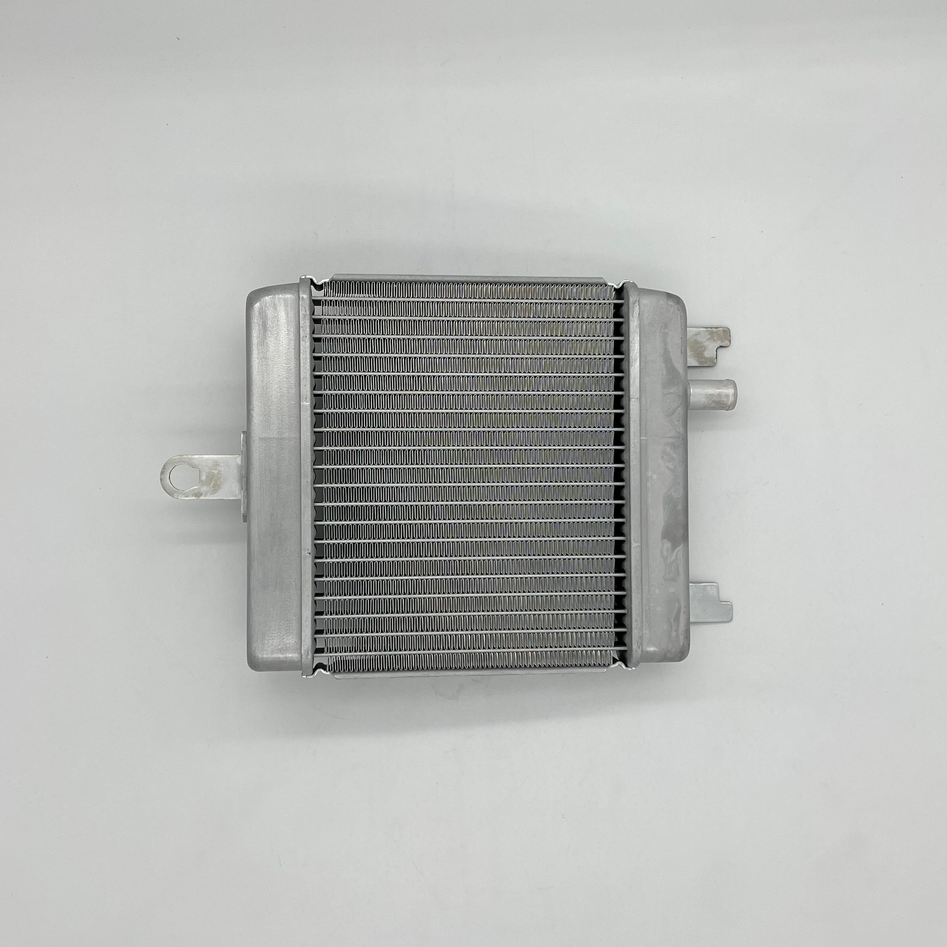 Metallic radiator on a gray background
