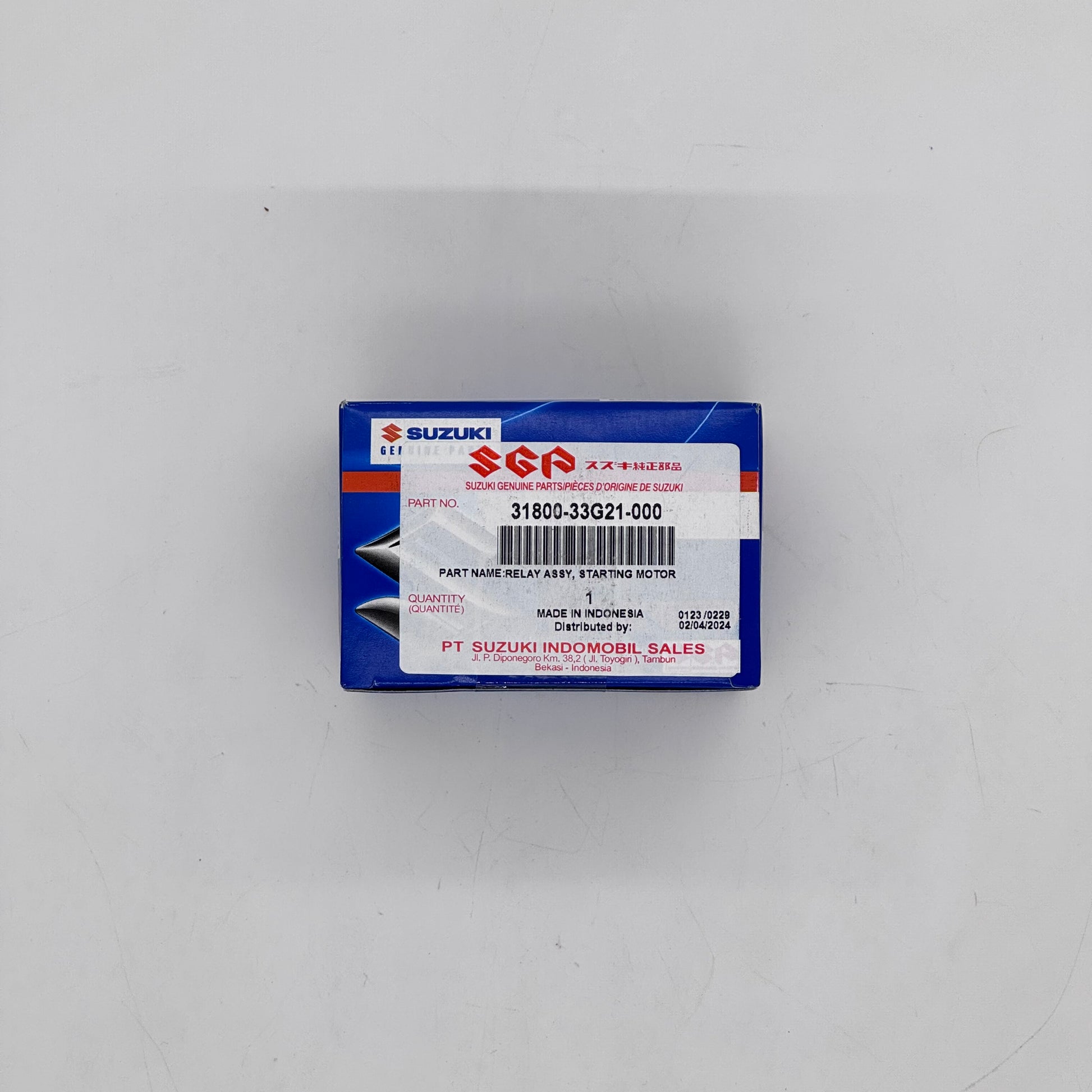 Suzuki relay box packaging on a white background