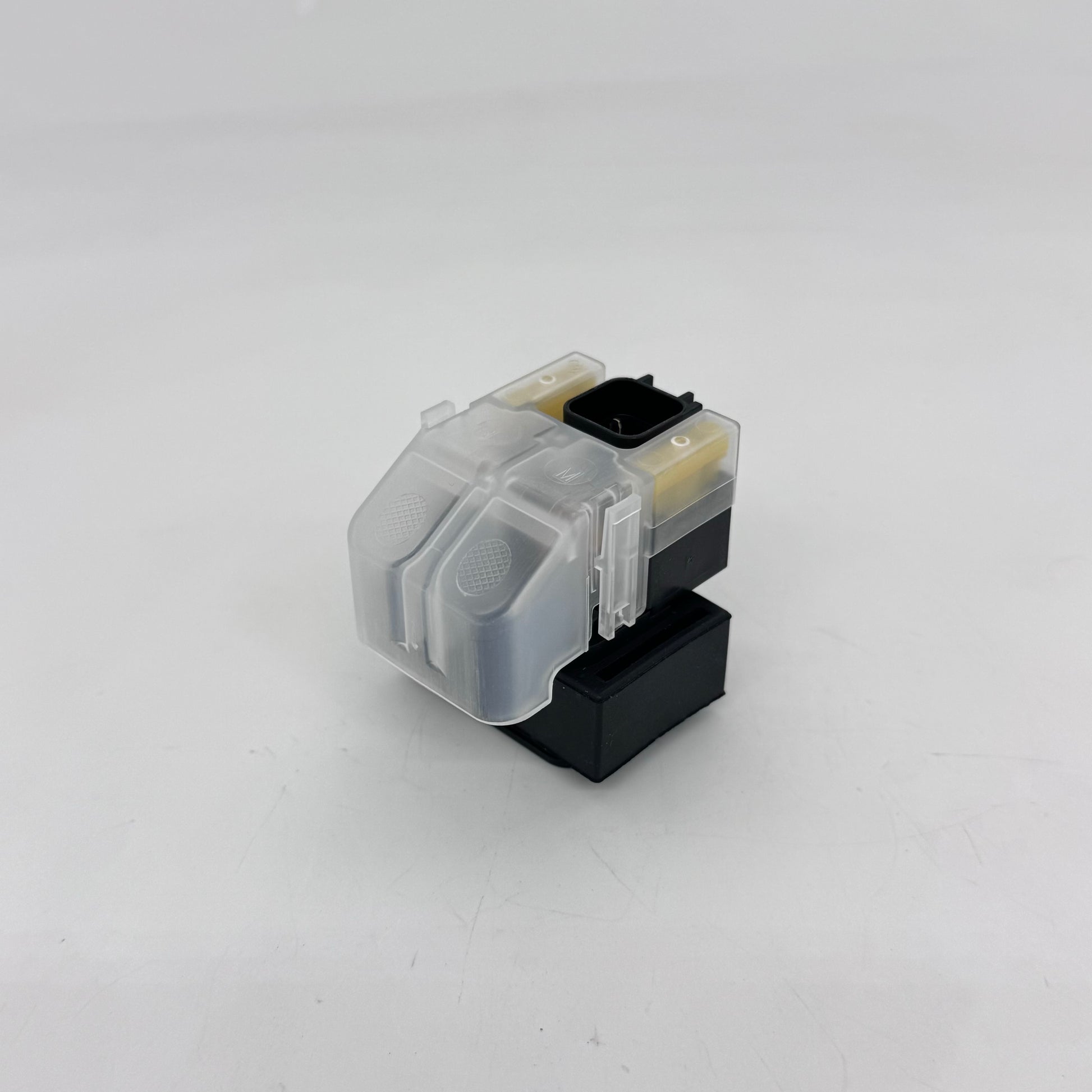 Clear and black ink cartridge on a light gray background