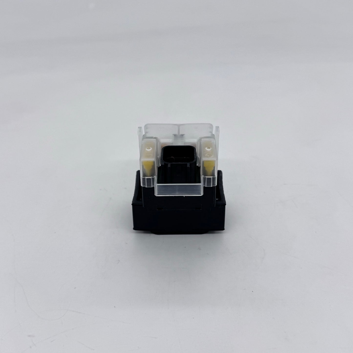 Small mechanical keyboard switch on a white background