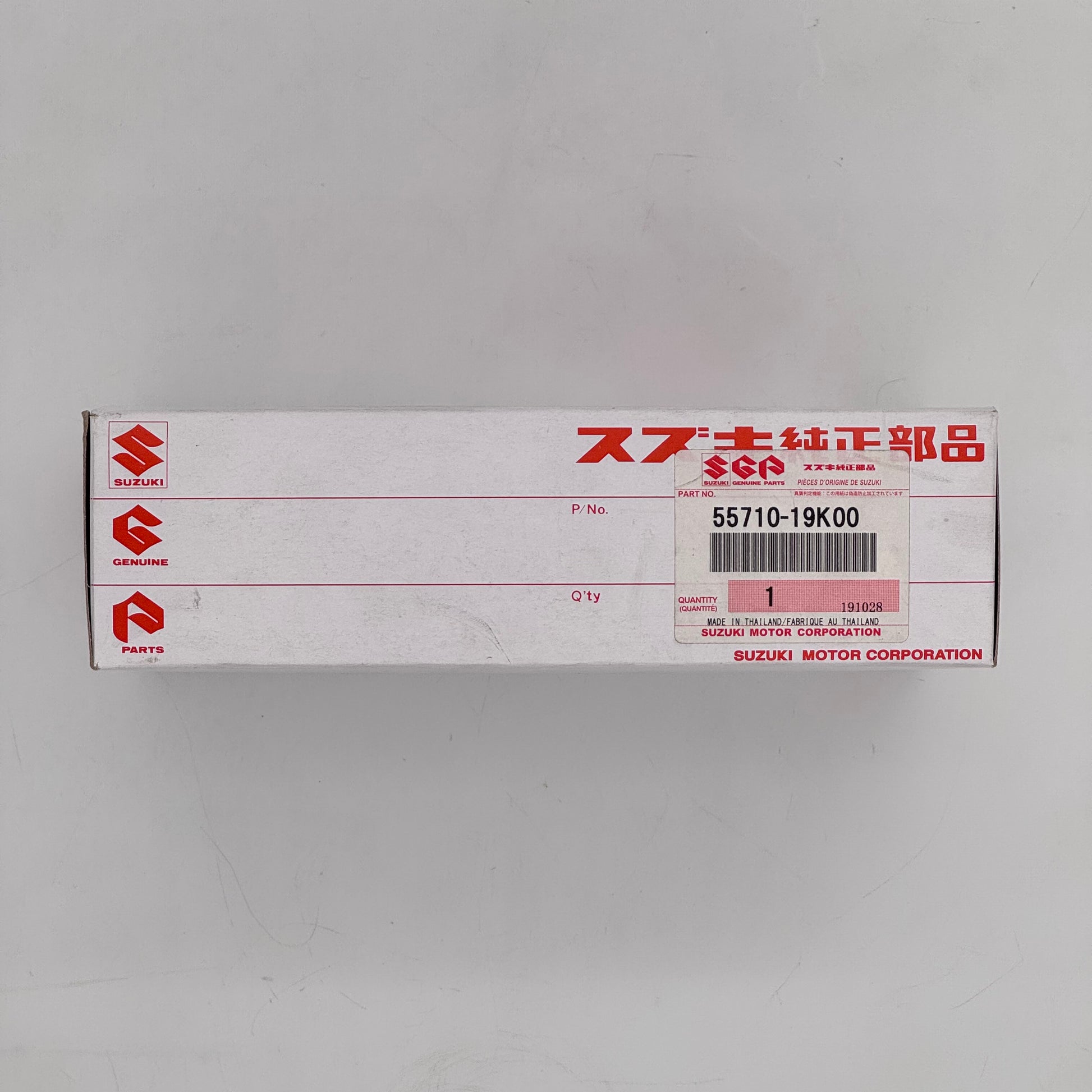 Suzuki parts box with red and black text on a white background