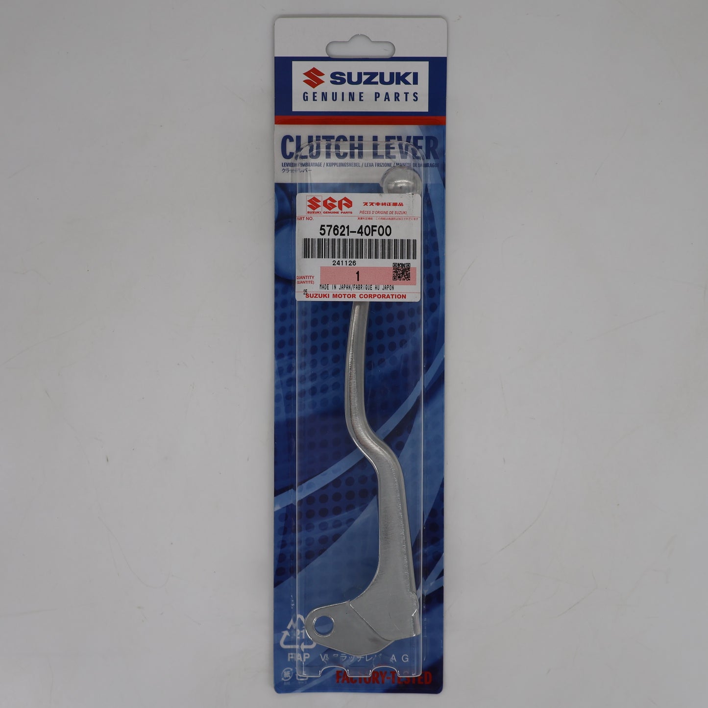 Suzuki clutch lever in packaging on a gray background