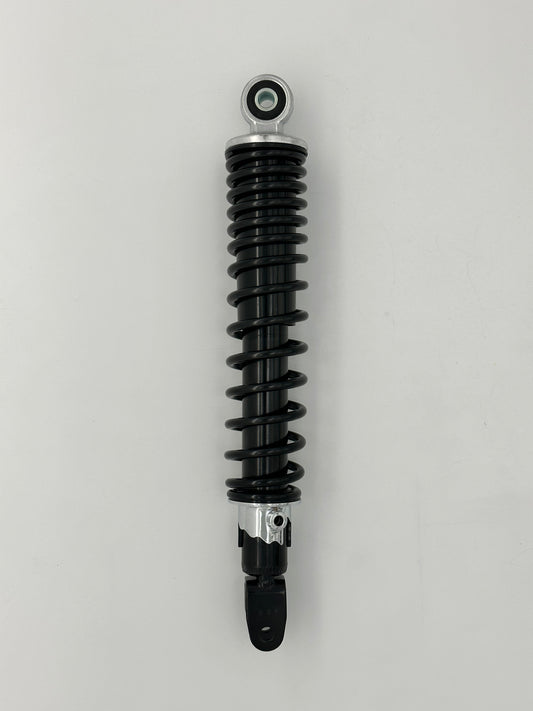 Black shock absorber on a gray background